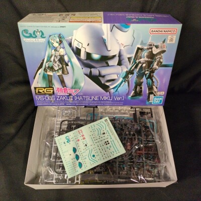 Bandai Spirits RG 1/144 Mobile Suit Gundam x Hatsune Miku MS-06S Zaku II [Hatsune Miku Ver.]